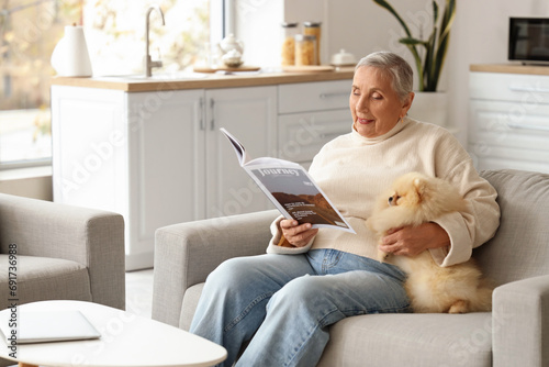 Senior woman with Pomerania...