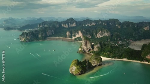Aerial view of tropical turquoise lagoon, beach between rocks and islands, Krabi, Railay, Thailand, 4k photo