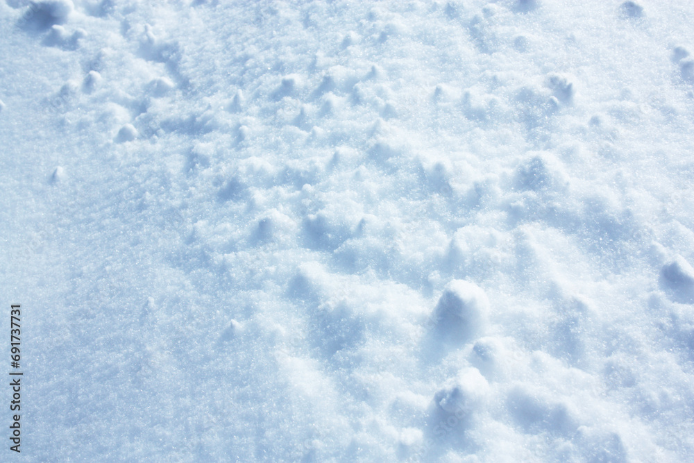 the texture of fluffy winter snow with lumps