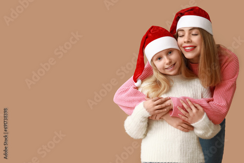 Cute little girl and her mo...