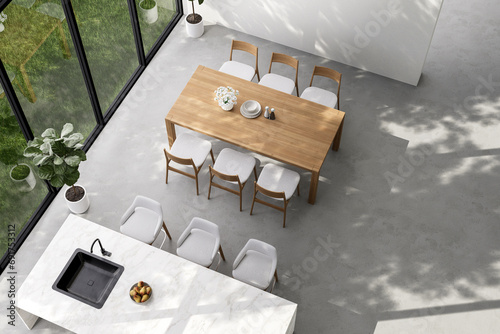 Top view of minimal loft style dining and kitchen with nature view 3d render There are whte paint wall and concrete floor decorate with wooden table and white marble top kitchen counter photo