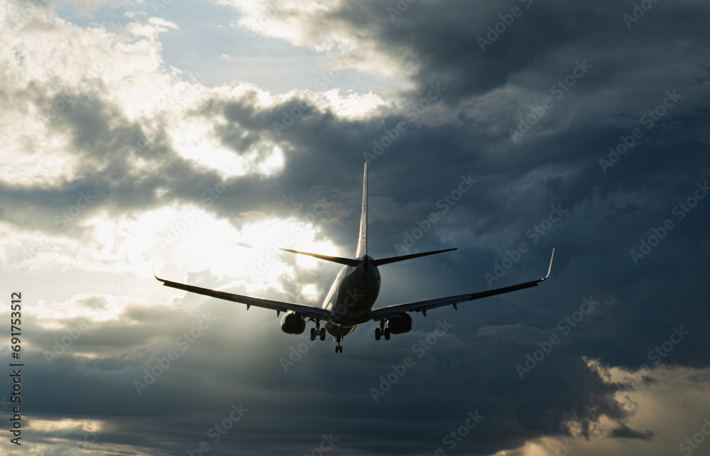 a commercial jet plane is on a landing position.