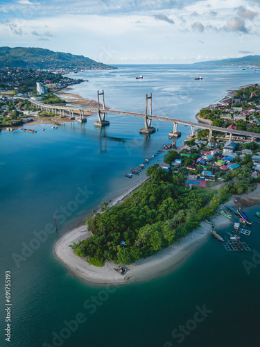 Aerial View of Merah Putih Bridge in Ambon Bay, Maluku Province, Indonesia photo