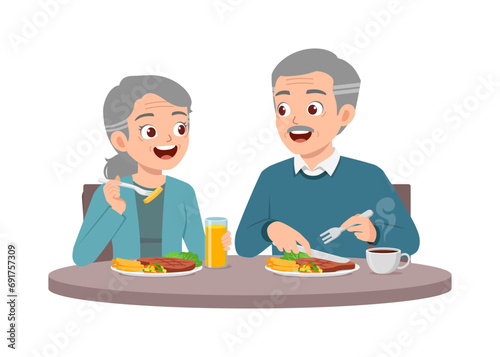 elderly couple man and woman eat meat steak together