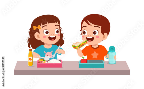 little kid having lunch with friend in school