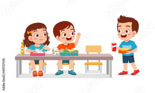 little kid having lunch with friend in school