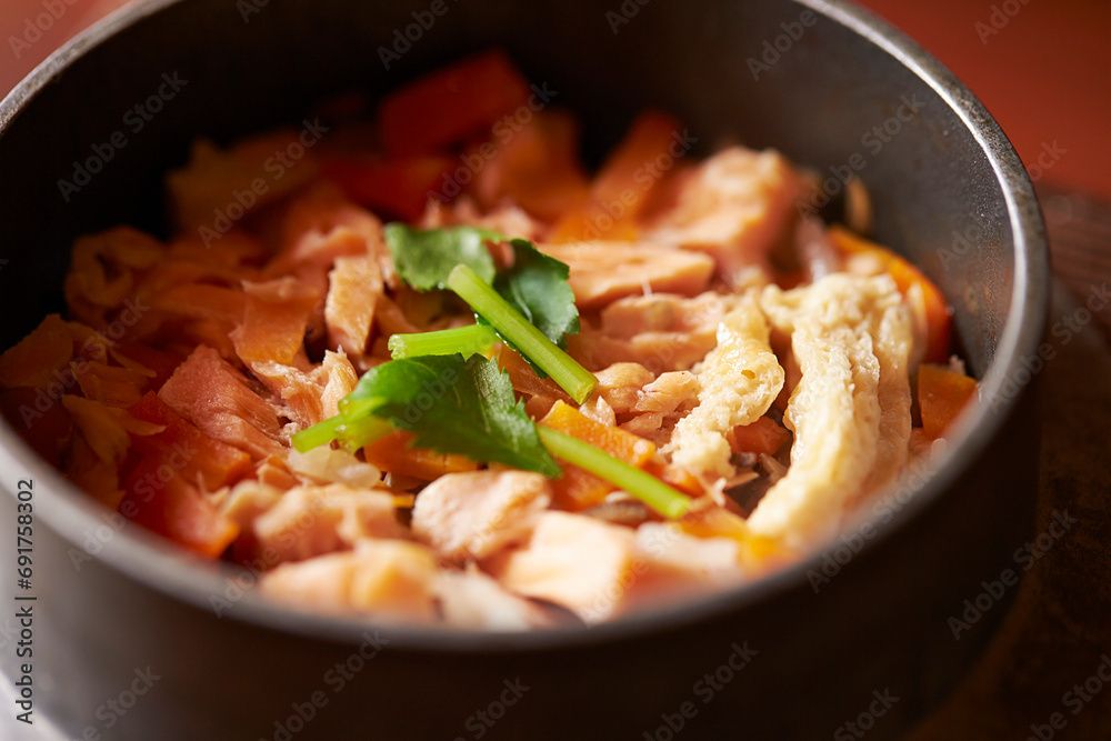 Stone pot rice with fish and vegetables Stone pot rice with fish and vegetables