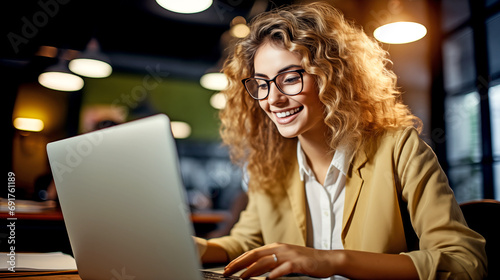 Happy Woman Using Laptop to Video Chat. Communicates with Colleagues or Clients.
