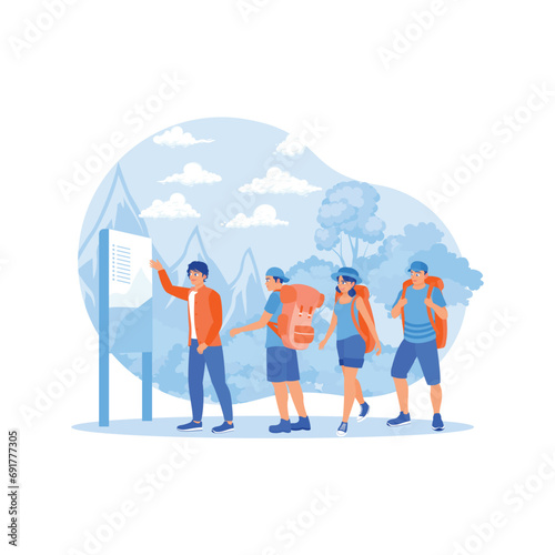 A group of tourists gather around a tour guide. The tour guide tells about the area. Tourist Guide concept.  trend modern vector flat illustration