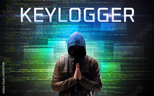 Faceless hacker on code background photo