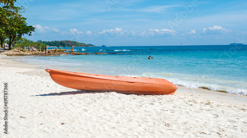 Koh Samet Island Rayong Thailand, a kayak on the white tropical beach of Samed Island with a turqouse colored ocean on a sunny day