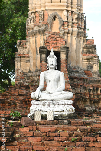 Buddha statue at ancient temples in Ayutthaya, Thailand.