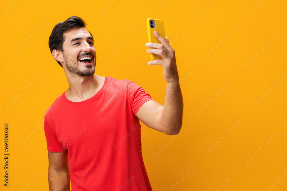 Copy man cyberspace portrait message communication smiling happy space studio yellow technology phone smartphone phone mobile Copy man cyberspace portrait message communication smiling happy space studio yellow technology phone smartphone phone mobile