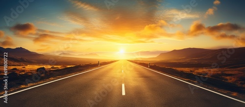 Sunrise over an empty road.