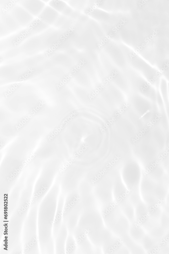 White water with ripples on the surface. Defocus blurred transparent white colored clear calm water surface texture with splashes and bubbles. Water waves with shining pattern texture background. White water with ripples on the surface. Defocus blurred transparent white colored clear calm water surface texture with splashes and bubbles. Water waves with shining pattern texture background.