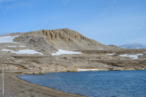 Rocky beach at Kinnvika, Murchison Fjord, Hinlopen Straight on Svalbard in the Arctic, as a nature background 