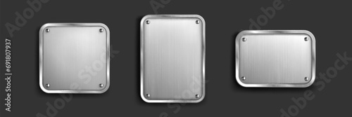 Steel tag plate with borders and screws. Realistic vector set of metal nameplates or boards with empty space for sign. Silver plaque or stainless frame mockup. Blank shape with chrome texture surface. photo