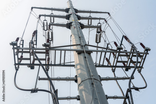close up view of electricity transmission tower with details.