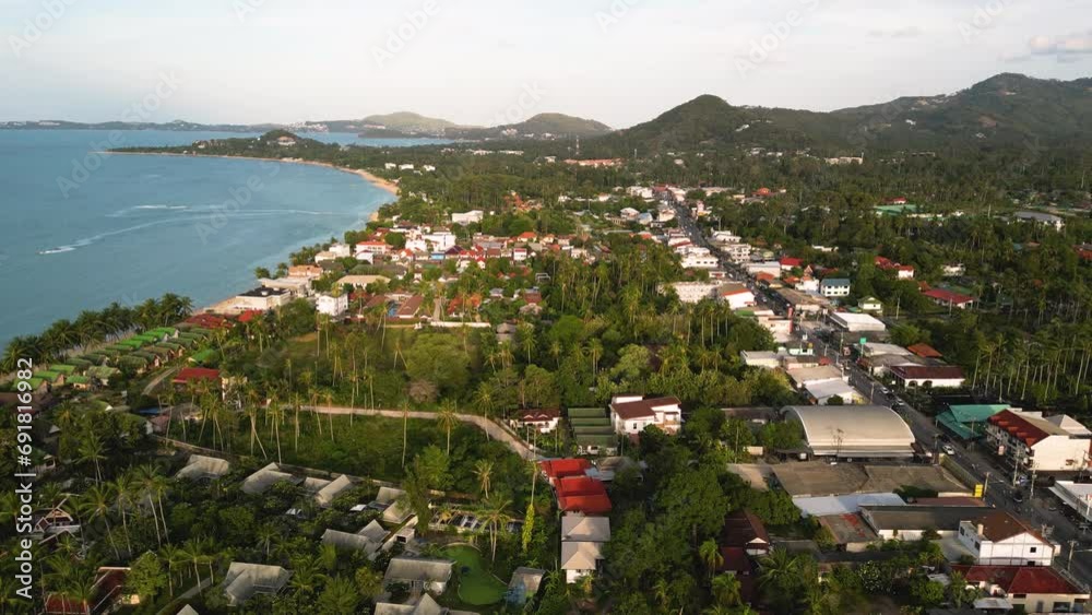Establishing aerial view of scenic Island coastline of Koh Samui at sunset, Thailand Establishing aerial view of scenic Island coastline of Koh Samui at sunset, Thailand