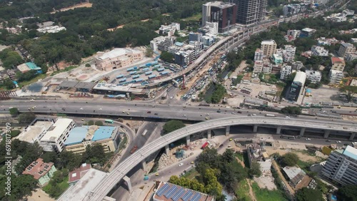 Aerial footage shows heavy traffic on the Central Silk Board junction, a road junction in Bangalore. Located to the Central Silk Board office complex near BTM Layout at the intersection of Hosur Road photo