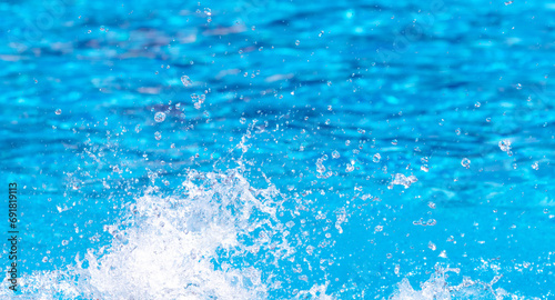 Splashes of water from a fountain as an abstract background