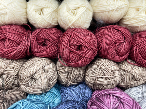 colorful wool yarn for knitting as background, close-up image