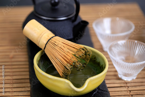 Matcha Whisk on Green Tea Mix Bowl