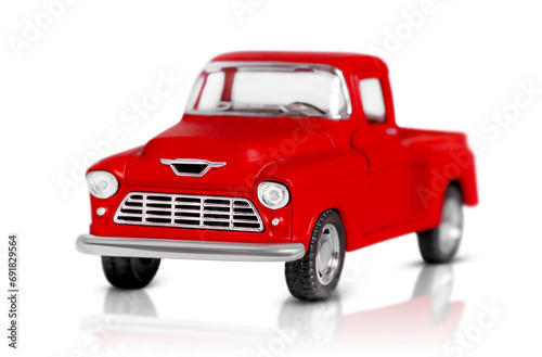  classic red toy truck is highlighted on a white background