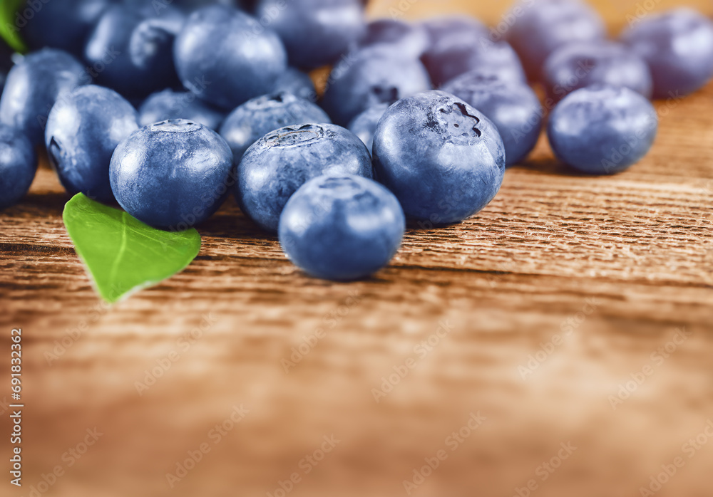 blueberries are scattered on the table, a place for text blueberries are scattered on the table, a place for text