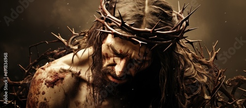 Jesus Christ, harmed and bloody with thorny crown, portrayed in sepia.