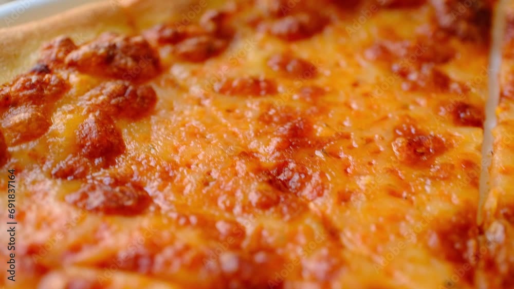 Large pizza with tomato paste and margarite sauce on a white plate, Italian pizza Large pizza with tomato paste and margarite sauce on a white plate, Italian pizza