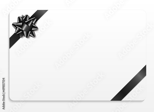 White gift card with black ribbon on white background