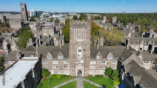 Crowell Quad at Duke University. Aerial rising shot revealing chapel and campus during autumn.