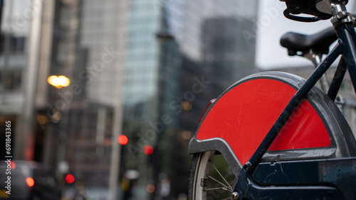 Canvas Print Red rear wheel cover on a bike in London