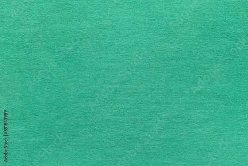 Interlining, green synthetic fibre. Background, texture.
 photo