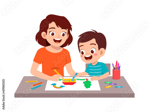 little kid drawing using crayon with mother