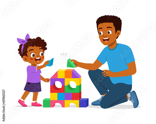 little kid and father playing brick together