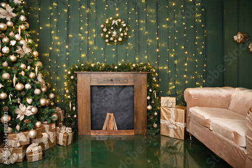 Gorgeous Christmas and New Year decor featuring Christmas tree decorated with golden decorations, Christmas wreath, fireplace, gifts and sofa photo