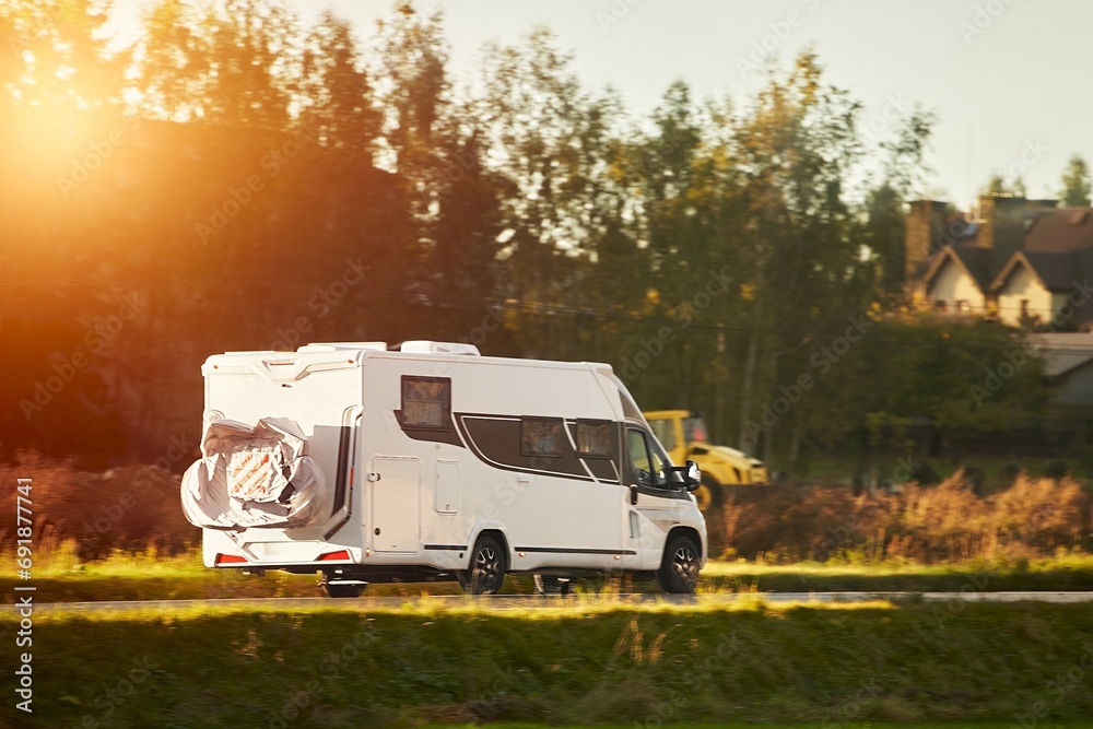 Discovering New Horizons. Traveling in a Camper Van with BikesTourists in rental campervan. Tourism in motorhome. Discovering New Horizons. Traveling in a Camper Van with BikesTourists in rental campervan. Tourism in motorhome.