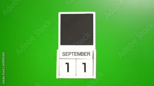 Calendar with the date September 11 on a green background. Illustration for an event of a certain date. photo