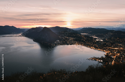 Sunset view from Monte Bre over the city of Lugano in Ticino, Switzerland.