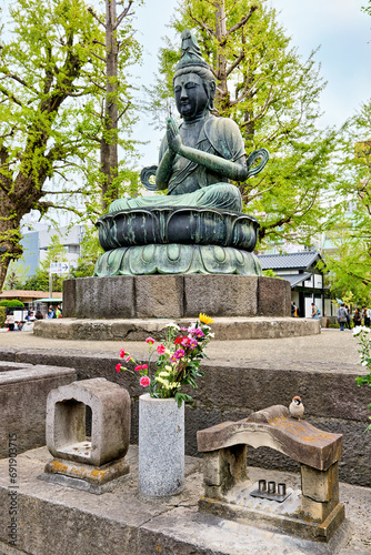 Japan. Tokyo. Senso ji temple at Asakusa. Two Buddhas