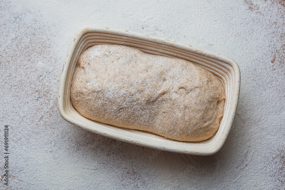 Bread proofing Whole grain dough in rattan baskets before baking Yeast-free sourdough bread Bread proofing Whole grain dough in rattan baskets before baking Yeast-free sourdough bread