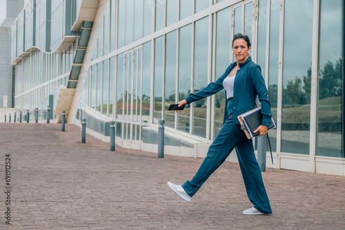 business woman walking full length