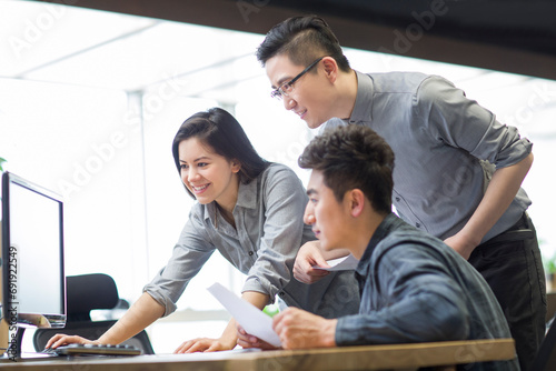 IT workers working in office photo