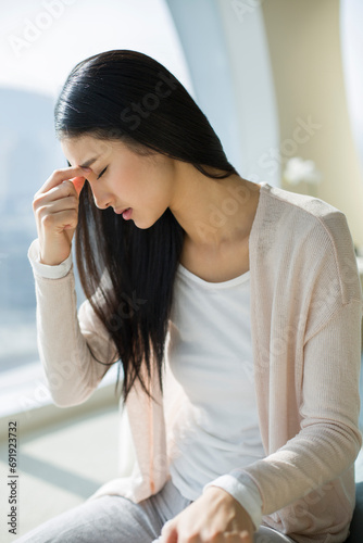 Young woman with headache photo