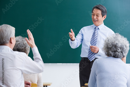 Senior adults having class at school photo