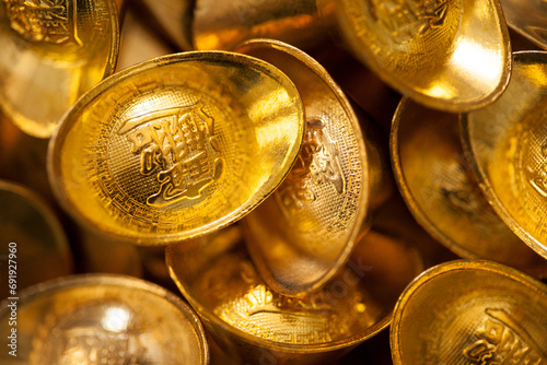 Chinese traditional currency gold yuanbao ingots photo