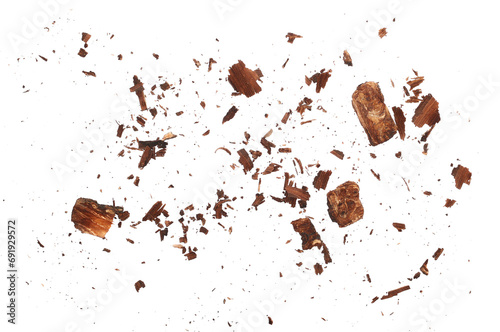 Rotten, old wood pieces and dust, scattered crushed tree bark isolated on white 
