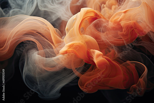 Abstract patterns of swirling orange smoke on the dark background with copy space